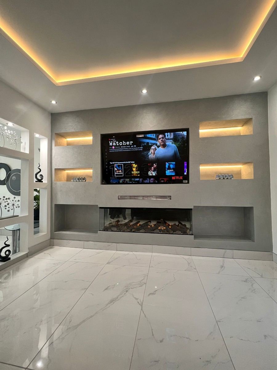 The Manhattan — bespoke full wall media wall installation with illuminated shelving and LED lighting, North West