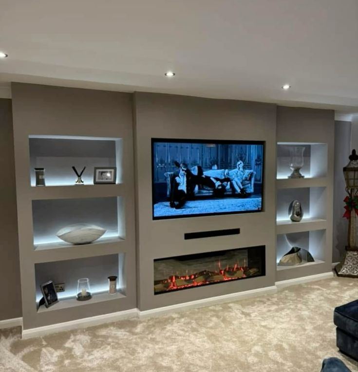 The Nordic — contemporary bespoke media wall with floating shelving and integrated lighting